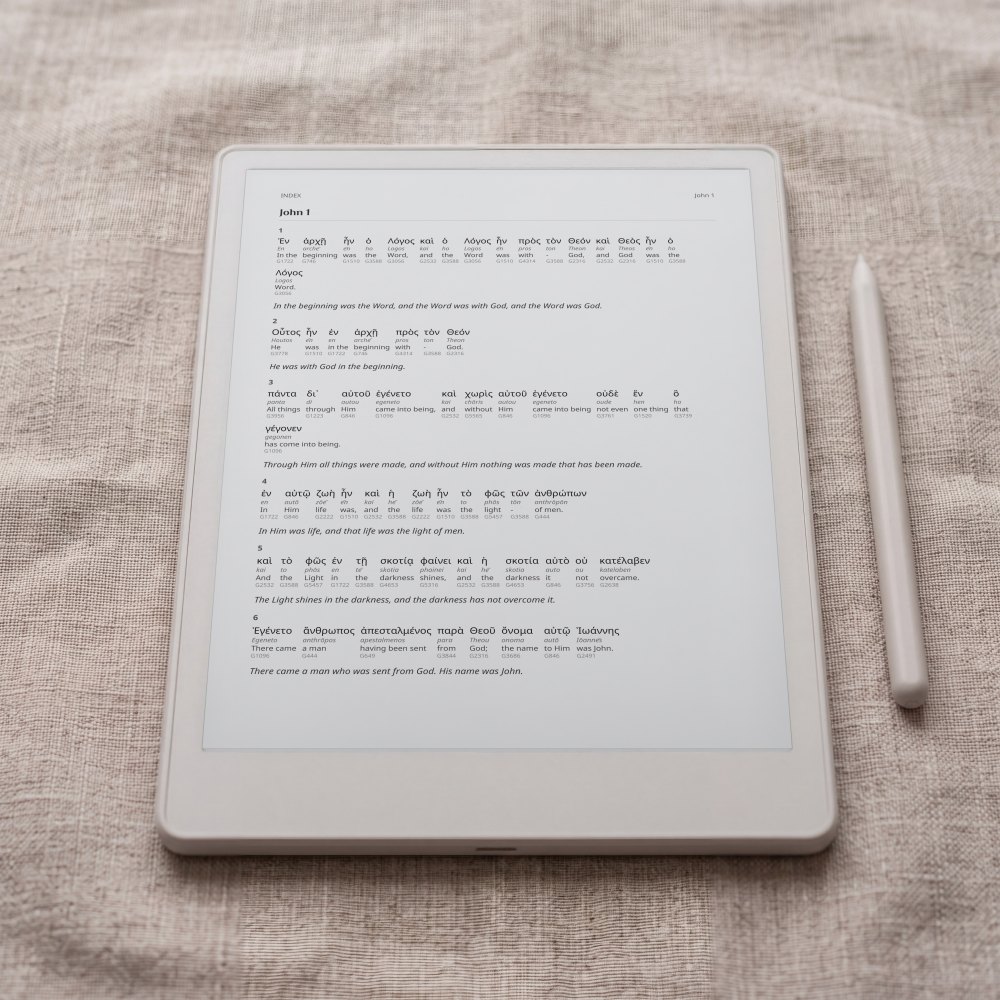 The Greek-English Interlinear New Testament interlinear edition at John 1, on an e-ink tablet